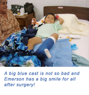 A big blue cast is not so bad and Emerson has a big smile for all after surgery!